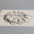 Soft and padded Lumee Novi play mat in natural lighting
